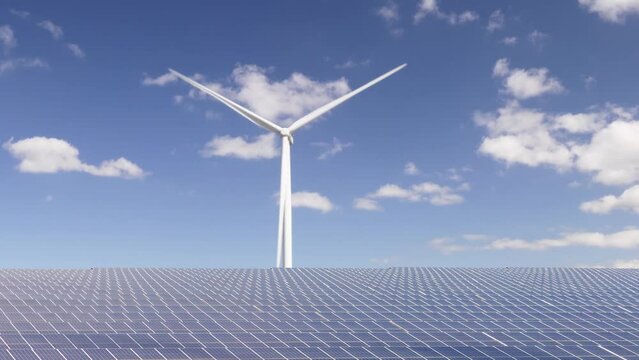 Horizontal pan of a large solar panel field in front of a rotating wind turbine