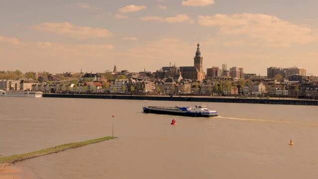 Panoramic view of the Dutch city of Nijmegen during afternoon with the river Waal in front
