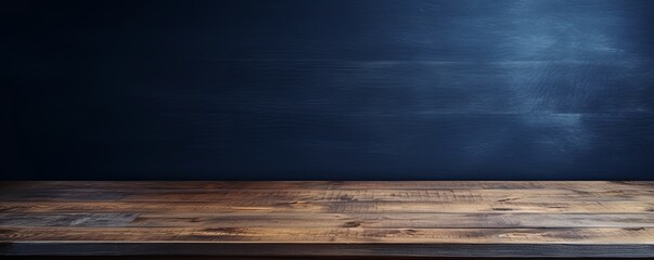 Abstract background with a dark blue wall and wooden table top for product presentation, wood floor, minimal concept, low key studio shot