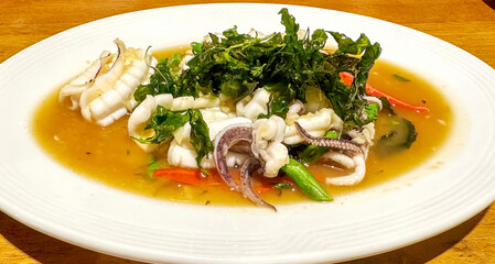 Spicy Thai food with seafood on a plate