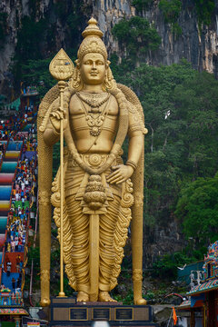 Batu Caves and the Murugan statue (The Hindu god of war )also known as Kartikeya , Skanda, Subrahmanya and Shanmukha . Gombak, Selangor Malaysia