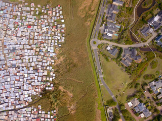 Aerial poor township and rich suburb in South Africa