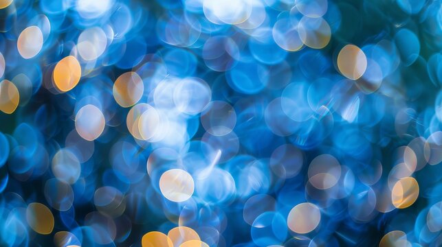 A blurry image of blue lights on a tree.