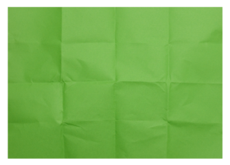 Green folded sheet of paper on isolated background