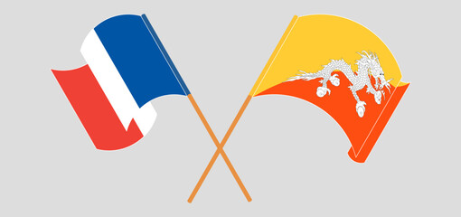 Crossed flags of France and Bhutan. Official colors. Correct proportion