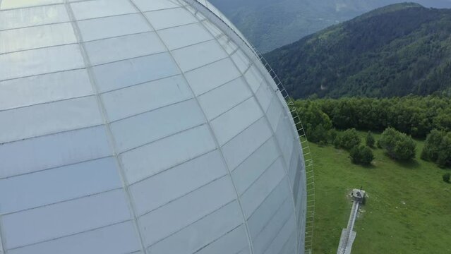 An aerial shot of the observatory in the mountains in summer. Special astrophysical observatory. Large Azimuth Telescope. Methods and instruments for astrophysical research.
