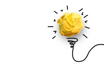 Ideas with yellow crumpled paper ball .Creative business concept.Concept of idea and innovation...