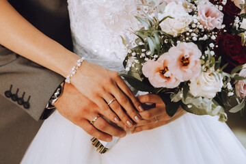 hands of bride and groom
