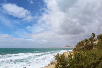 beach and sea,natural blue background, beautiful coast of the Mediterranean Sea in Alicante, Spain 