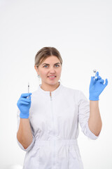 Dermatologist in white clothes and gloves standing with a syringe in hand