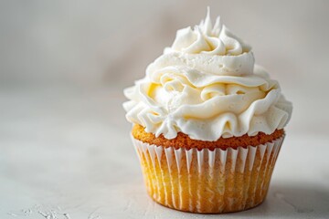 Delicious cupcake with white frosting, perfect for bakery or dessert concepts