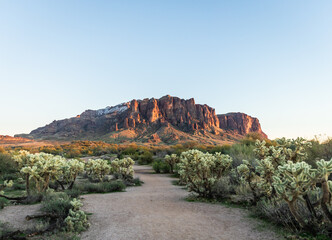 Evening panorama of the Superstition Mountains in Arizona and clear blue sky.