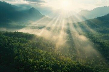 Sun shining through clouds over mountain range. Suitable for nature and landscape concepts