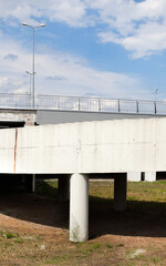 The ramp of the grade-separated road junction. - obrazy, fototapety, plakaty