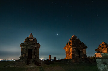 Sleman, Indonesia - July 14,  2015. Milky Way galaxy stretches in the sky Sleman with the foreground of the ijo temple