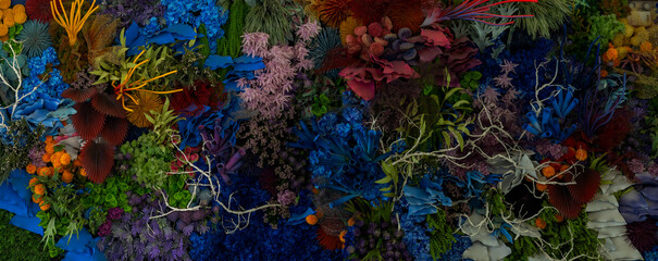 Colorful coral reef . Living Coral background made of roses and many flowers