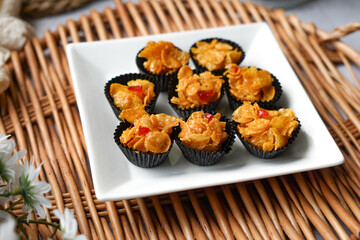 Honey Cornflakes (Cornflakes Madu) a popular cookies in Malaysia during celebration of Eid Mubarak (Hari Raya) on selective focus