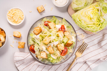 Caesar Salad with Lettuce, Cheese, Cherry Tomatoes and Croutons