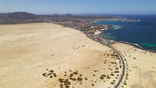 Aerial view of Medano beach (Playa del Medano) and Corralejo town, Fuerteventura, Canary islands, Spain