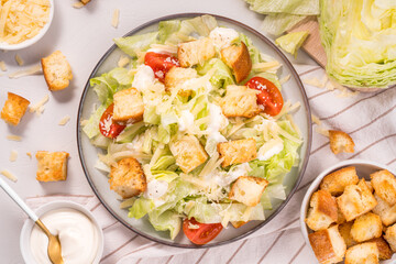 Caesar Salad with Lettuce, Cheese, Cherry Tomatoes and Croutons