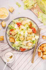 Caesar Salad with Lettuce, Cheese, Cherry Tomatoes and Croutons