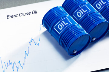Oil price up growth graph and crude oil barrels fossil fuel petroleum production.
