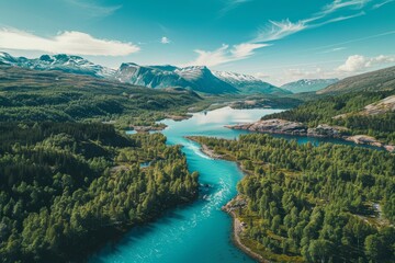 Top view of blue river in the green forest with the mountain.