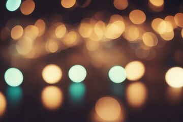 Golden blurred colored lights on dark background.