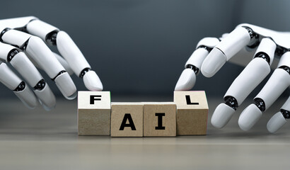 Symbol for artificial intelligence (AI) failure. Hand turns cubes and changes the expression AI to fail.