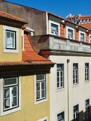 Vintage facades on old-fashioned retro buildings on the hills of Lisbon, Portugal. Portuguese historical architecture