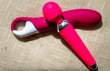 2 dildos next to the pillow, a small collection of intimate toys for the girl's pleasure. Sexual...