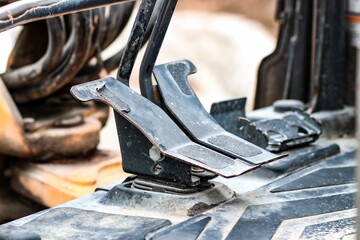 a bunch of metal pieces are shown on a piece of equipment
