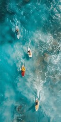 A group of surfers flying on their boards in the ocean, aerial view
