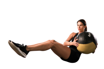 Fit and muscular woman exercising with medicine ball on a transparent background
