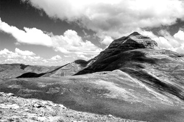 Dramatic Black and White view of Ribbok kop, one of the high peaks of the Drakensberg Mountains in...
