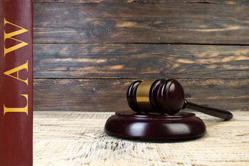 Law and Justice, Legality concept, Judge Gavel on a wooden background, Law library concept.