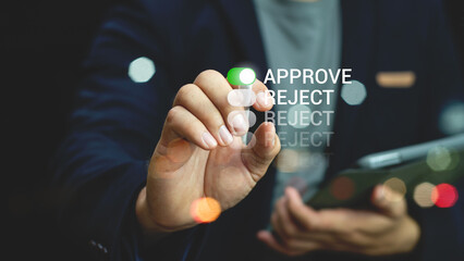 Approve concept. businessman touching check mark to approve document or project on virtual screen.