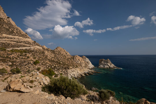 Magnificent Kalou beach with rugged cliffs on the greek island of Ikaria in Greece.