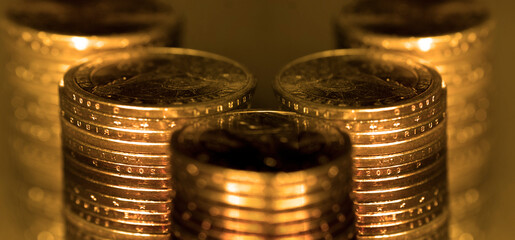 Old Gold Coins in Stacks and Piles for Cash Money Representing Wealth and Riches - 791808996