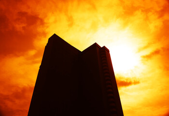 Silhouette of sunset city building centered illustration