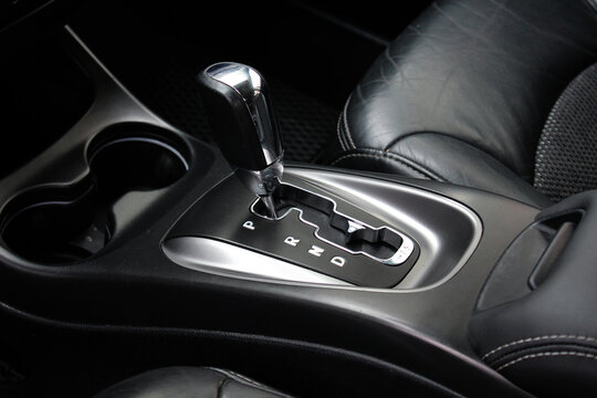 Automatic transmission shift selector in the car interior. Modern Automatic Transmission in Car. Gear lever close up. Automatic gearbox.