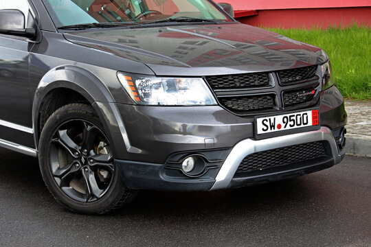 Vinnytsia, Ukraine; April 20, 2024. Grey Dodge Journey Crossroad front of the car. Mid Size Sport Crossover SUV Dodge Journey front bumper and radiator grill.