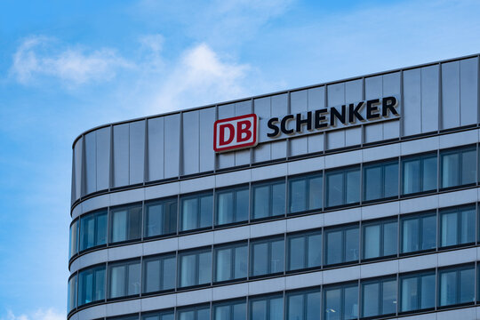 multi-storey modern building featuring with DB Schenker logo, division of German rail operator Deutsche Bahn focuses on international logistics, Frankfurt, Germany - February 19, 2024