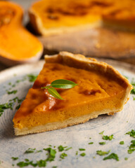 American pumpkin pie cooked with cinnamon and other spices. Special fall and halloween recipe.