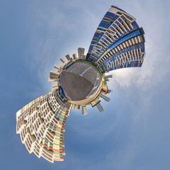 abstract swirling tiny planet spherical panorama of multi-storey buildings of skyscrapers of a residential complex in the form of a butterfly in blue sky - 791820322