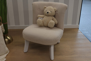 Teddy bear in a chair as decoration