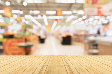 Empty wood table top with supermarket blurred background for product display - 791831595