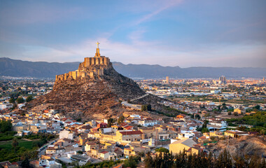 Panoramic view of the Murcia orchard with the Monteagudo castle as the protagonist and the city of Murcia in the background with early morning light