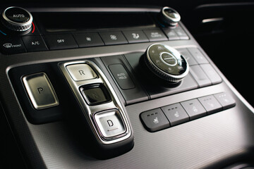 Car control dashboard. New car interiors. Elegant modern navigation panel with buttons. Part of...