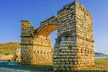 The Alconétar bridge was a Roman bridge over the Tagus River, it is one of the oldest segmental arch bridges in the world, it was part of the Roman road later called Via de la Plata - obrazy, fototapety, plakaty